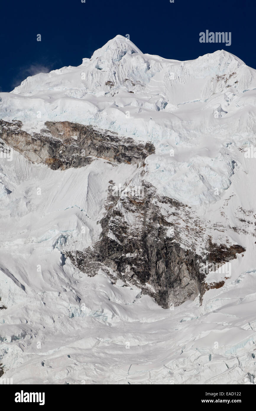 The snow-covered mountain Nevado Chopicalqui, Cordillera Blanca, Peru Stock Photo