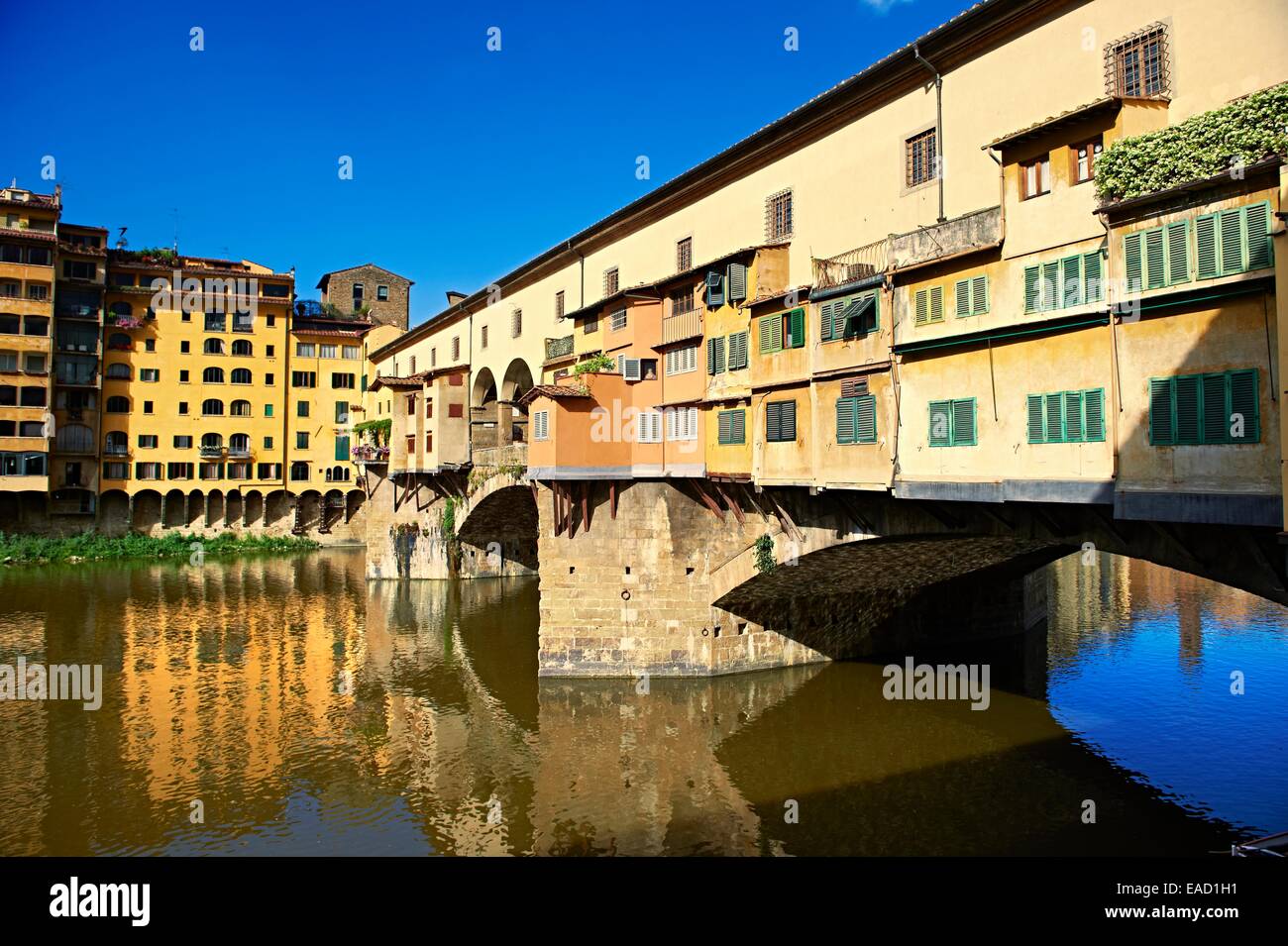 The medieval Ponte Vecchio bridge crossing the River Arno in the historic centre of Florence, UNESCO World Heritage Site Stock Photo