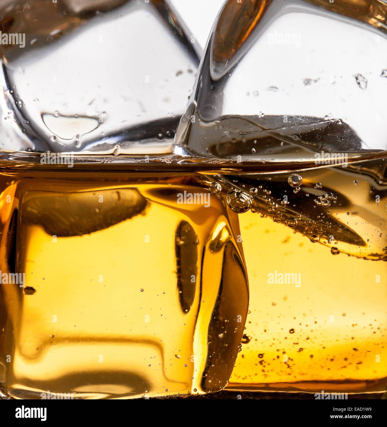 Detail shot of whiskey with ice cubes Stock Photo