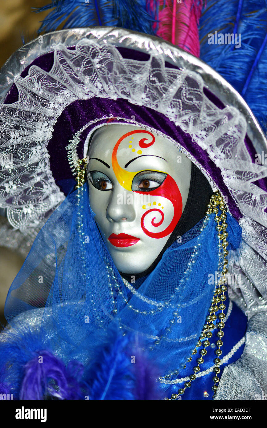Woman with silver mask and blue costume, Carnival Venice Stock Photo