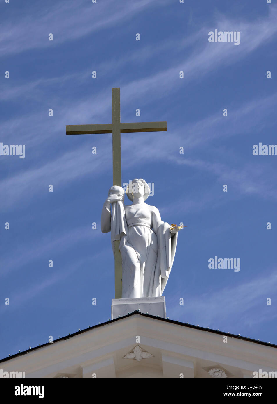 Statue of saint Helena holding cross on top of the Vilnius cathedral, Lithuania Stock Photo