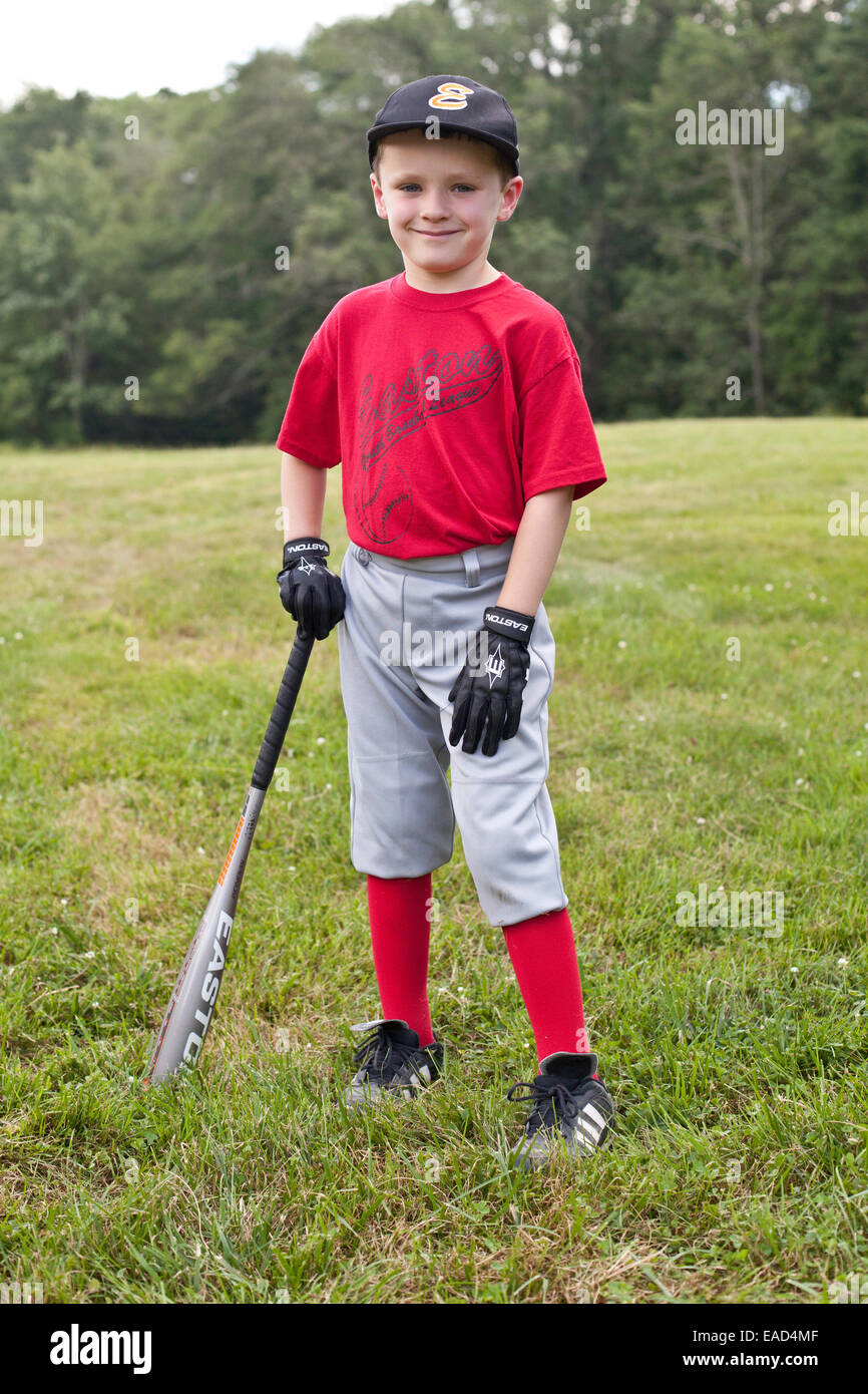 Little boy dressed baseball uniform a baseball glove ready to play Photo -