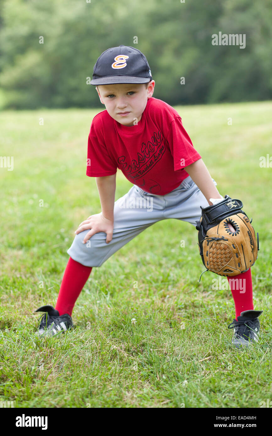 boy in baseball uniform