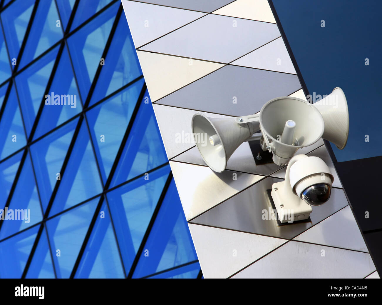 Modern security equipment placed on modern architecture building Stock