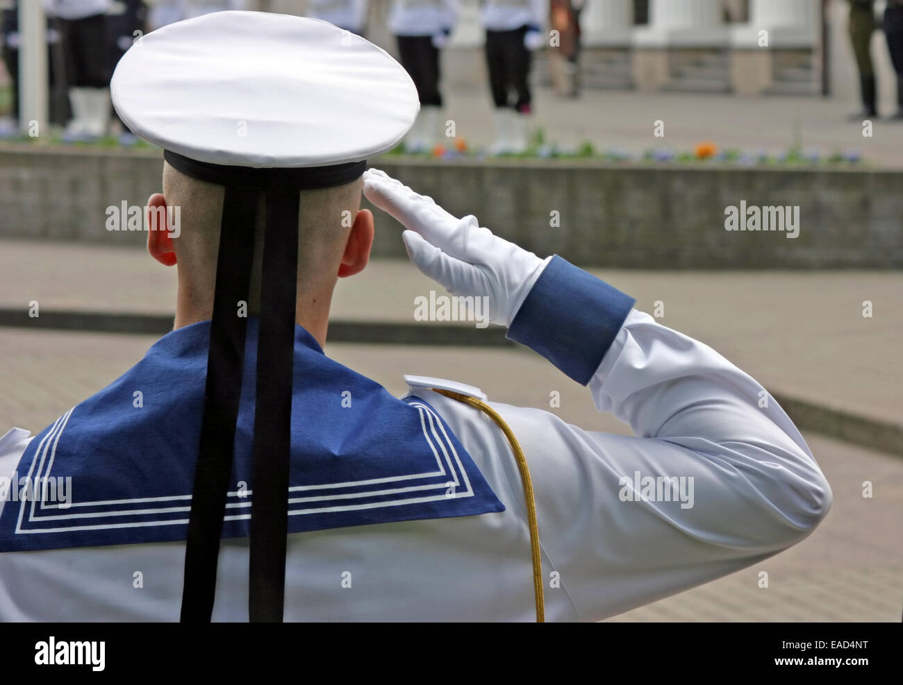 Navy soldier salutes at the Lithuanian national flag ceremony in Vilnius Stock Photo