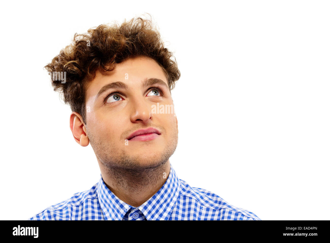Young man with curly hair hi-res stock photography and images - Alamy