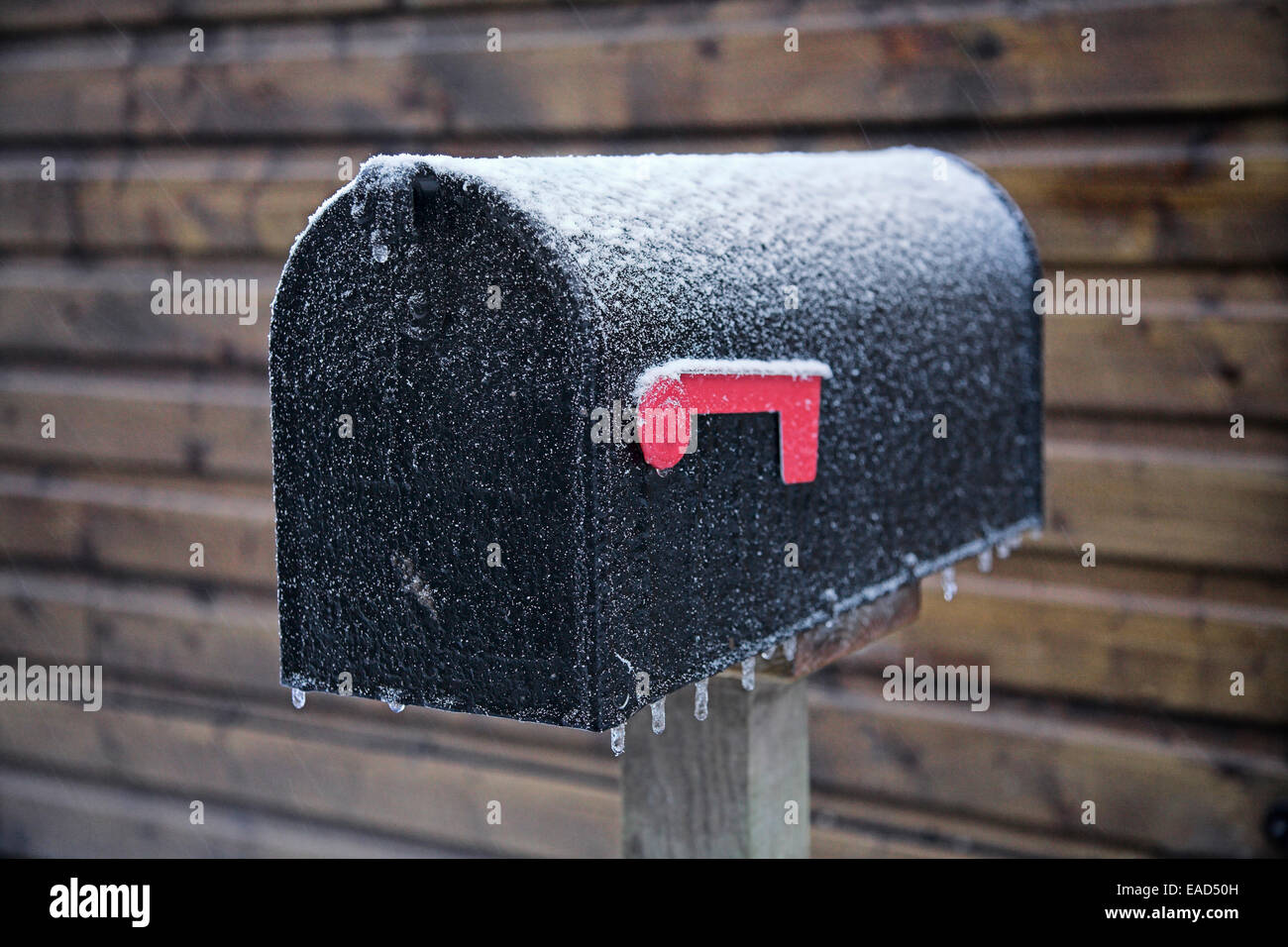 American style post box frozen closed due to sub zero temperatures. Stock Photo