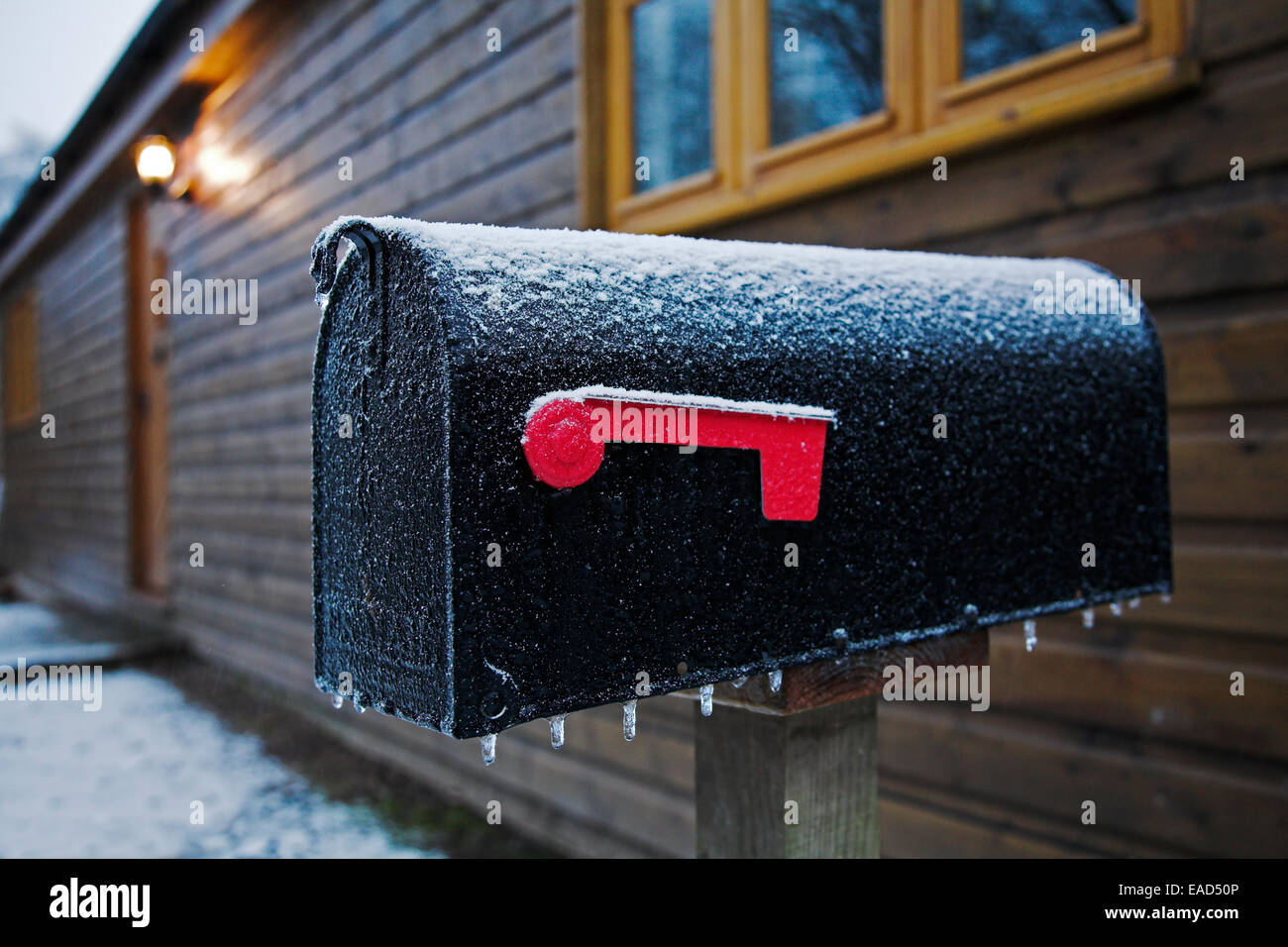American style post box frozen closed due to sub zero temperatures. Stock Photo