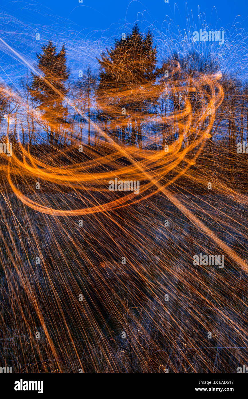 Shower of sparks in the countryside. Stock Photo