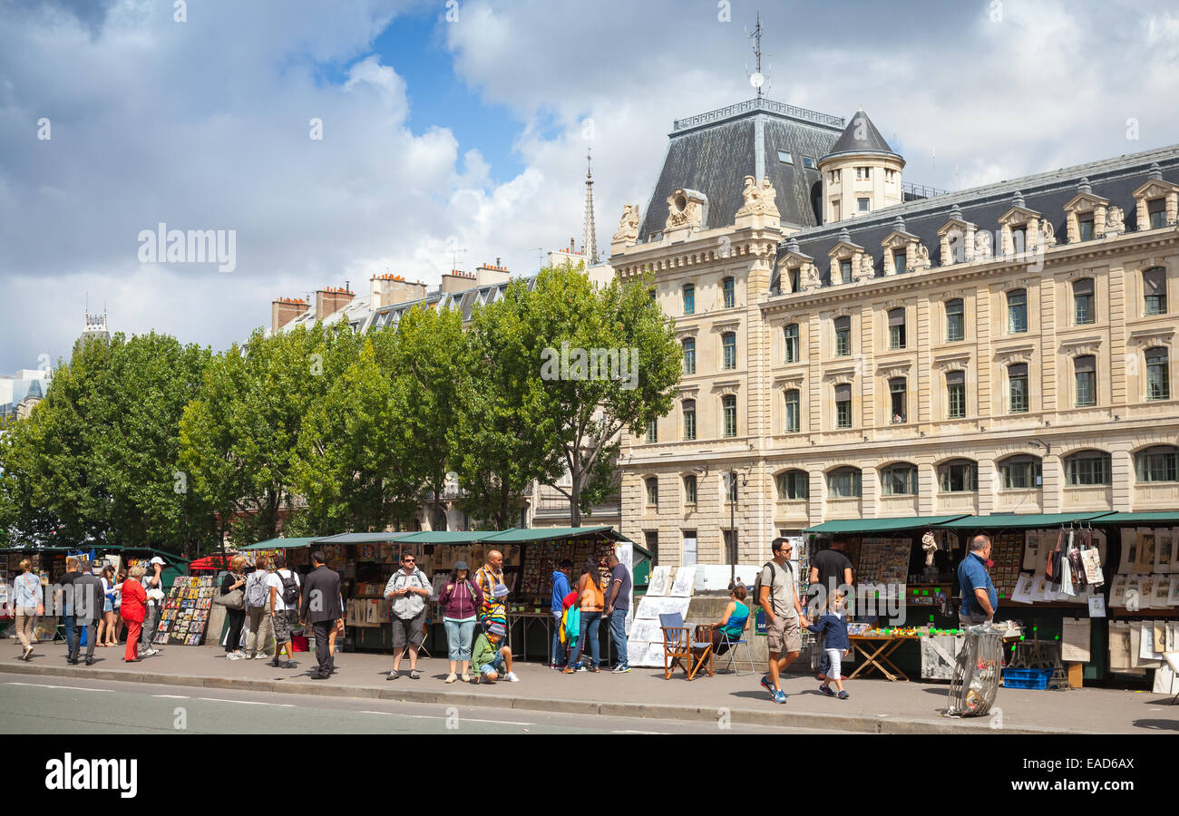 Paris, France - August 11, 2014: Street souvenir shops with tourists near Prefecture de Police on the Site island in Paris Stock Photo