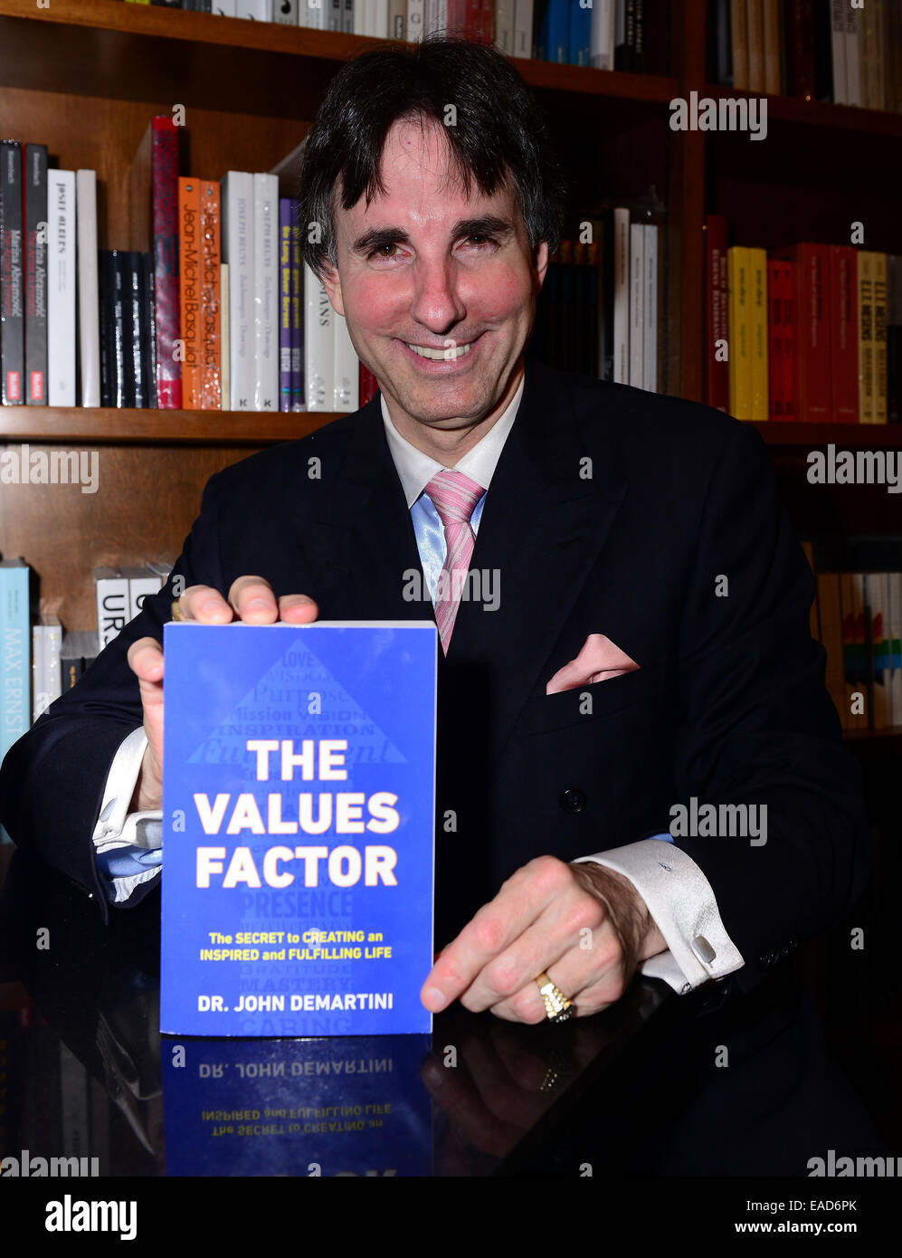 Author dr john demartini signs hires stock photography and images