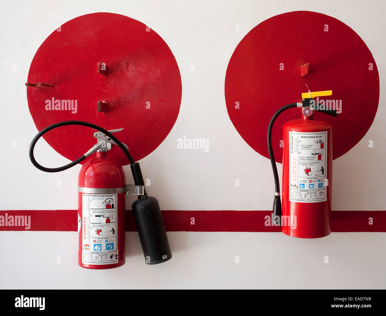 Fire Extinguishers On Wall Stock Photo