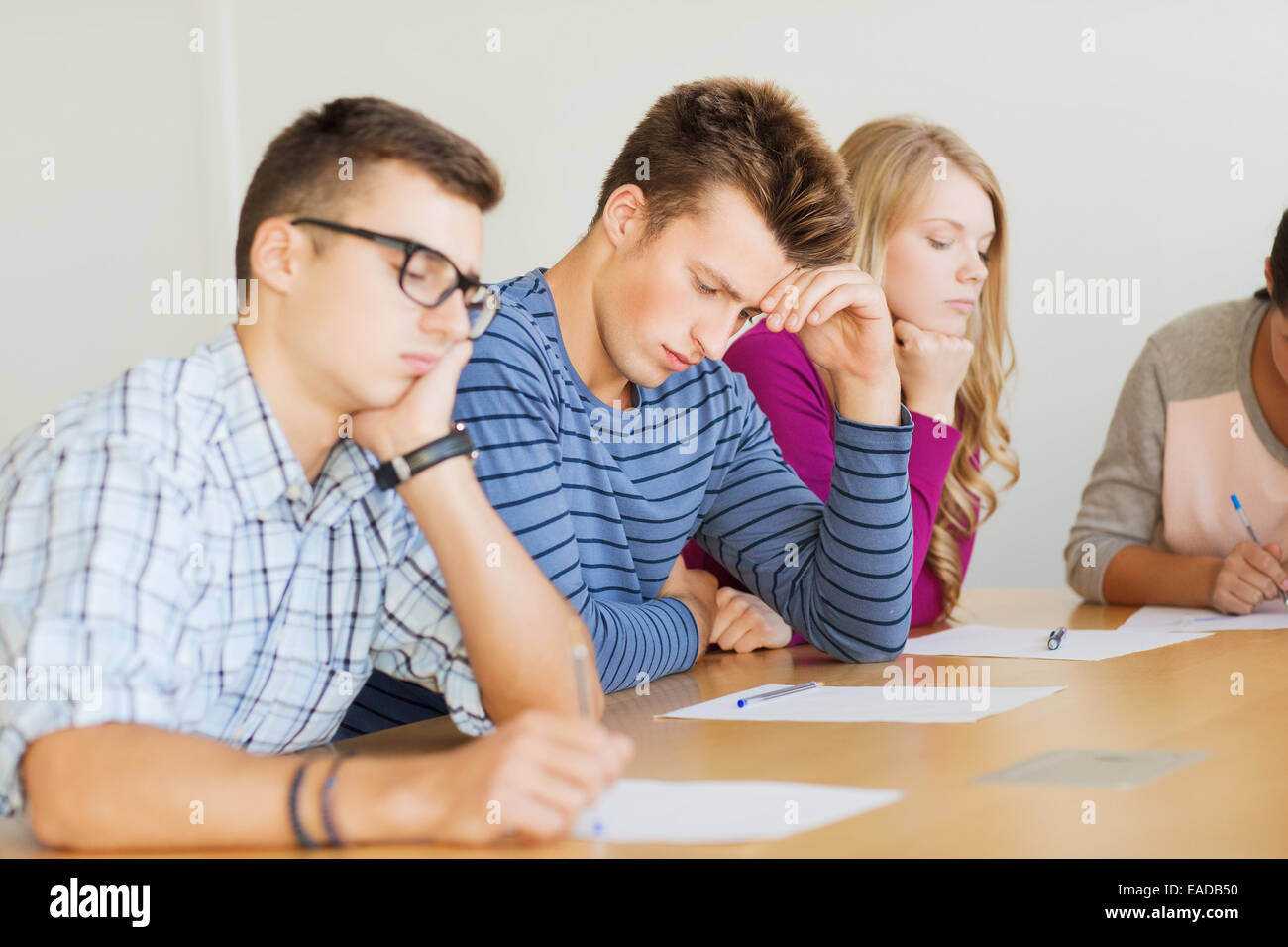 group of students with papers Stock Photo Alamy