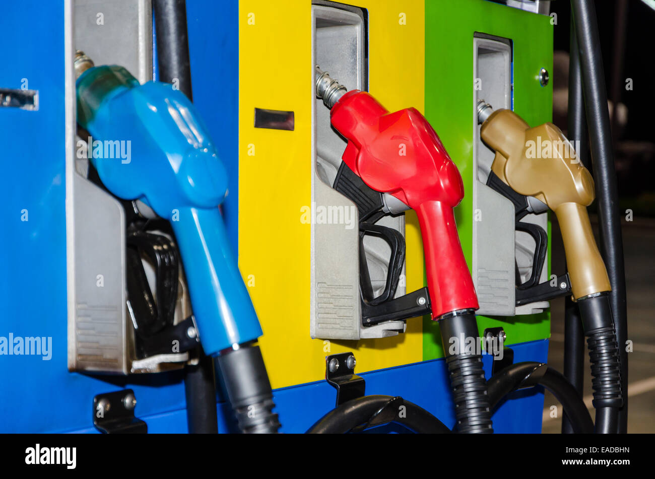 Three color fuel oil nozzle at night time Stock Photo