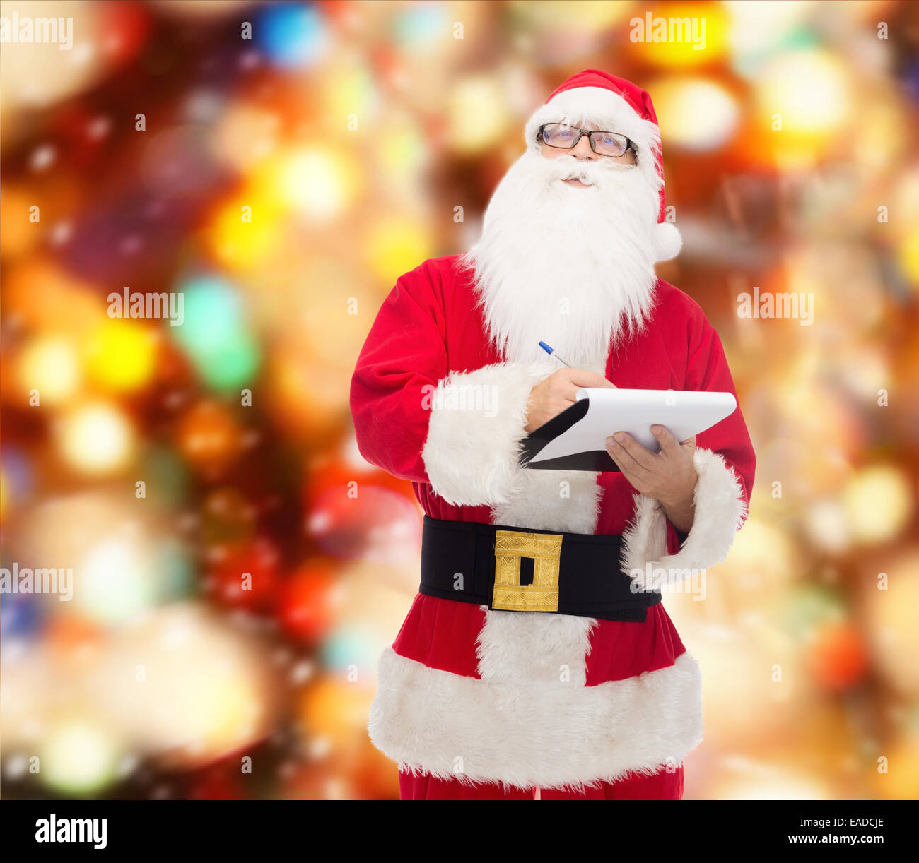 man in costume of santa claus with notepad Stock Photo - Alamy
