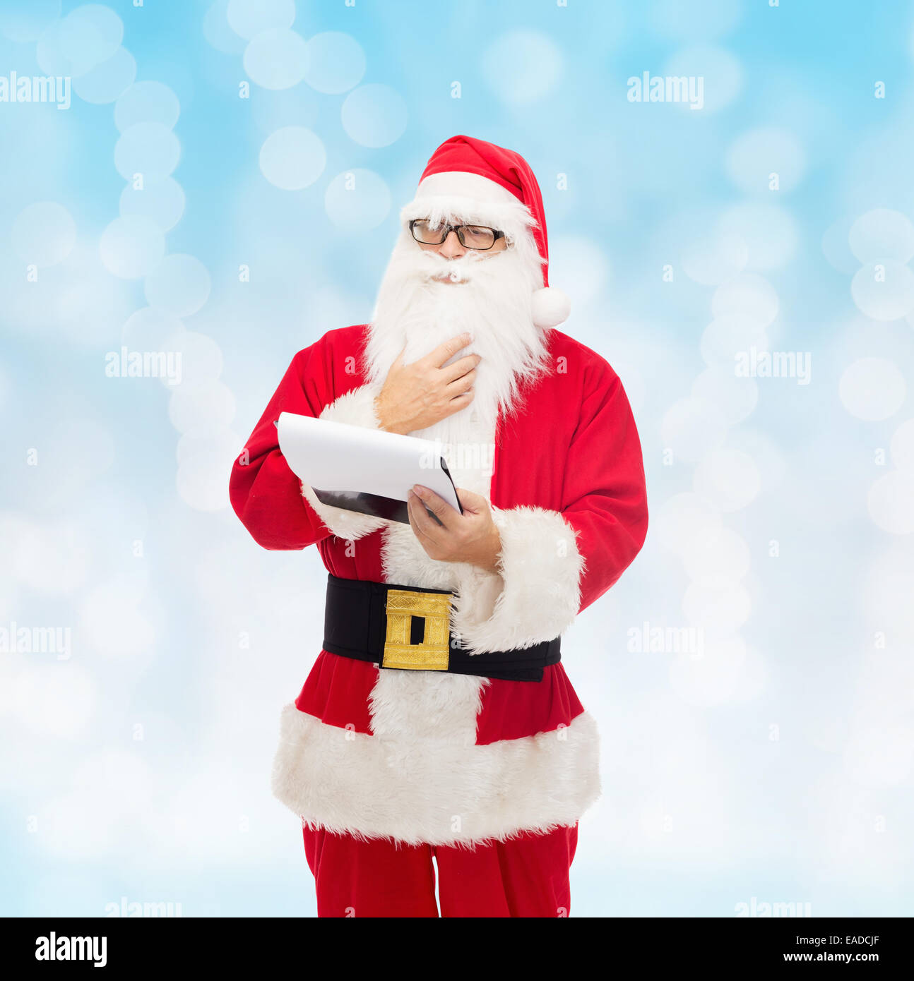 man in costume of santa claus with notepad Stock Photo - Alamy