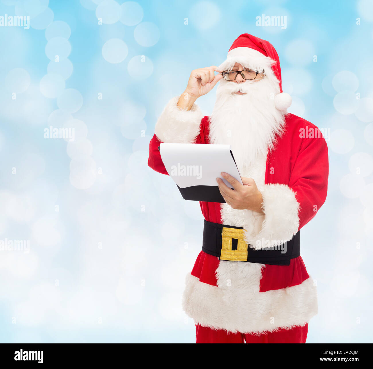 man in costume of santa claus with notepad Stock Photo - Alamy