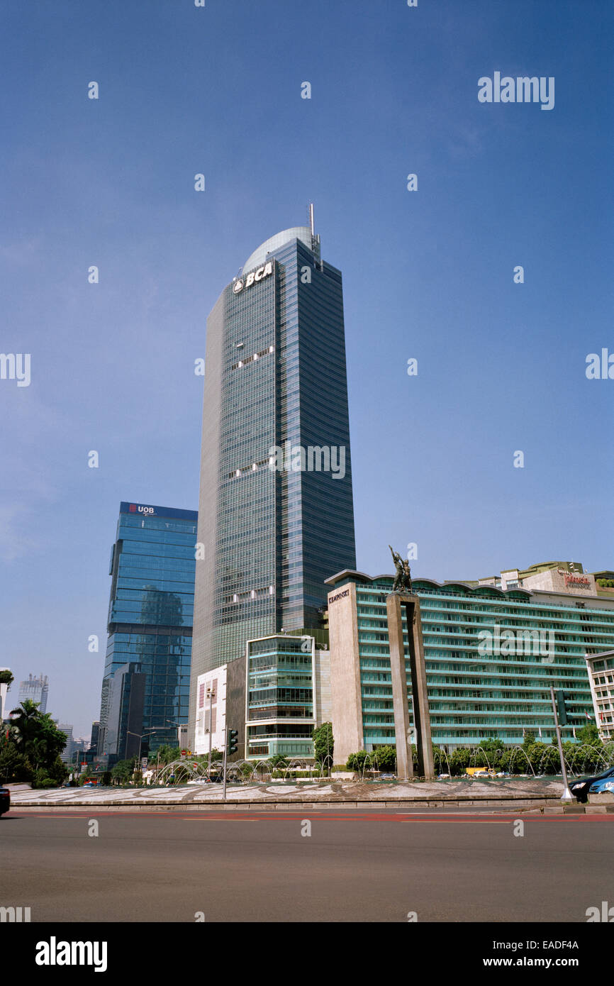 Travel Photography - City street scene of Selamat Datang Monument in Jakarta in Java in Indonesia in Southeast Asia Far East. Cities Urban Landscape Stock Photo