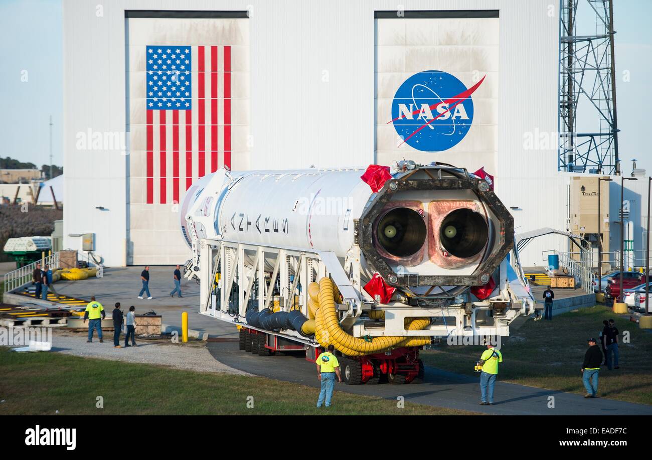 The Orbital Sciences Corporation Antares rocket, with the Cygnus spacecraft onboard, rolls from the Horizontal Integration Facility to launch Pad-0A, October 24, 2014, at NASA's Wallops Flight Facility in Virginia. The Antares will launch with the Cygnus spacecraft filled with over 5,000 pounds of supplies for the International Space Station. Stock Photo