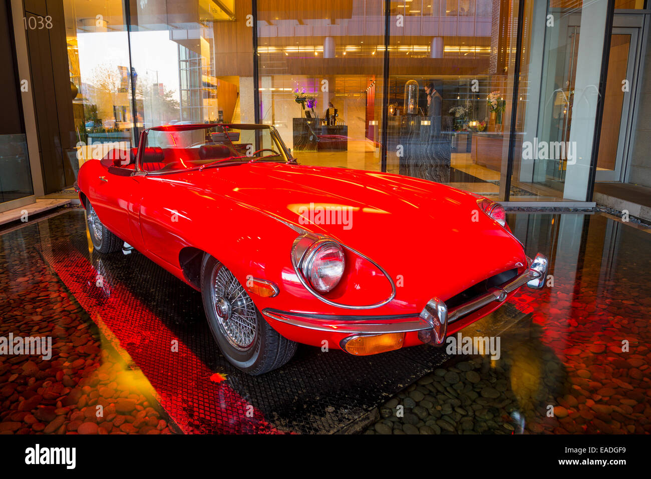 Red Jaguar convertible sports car, E Type 42, Fairmont Hotel, Vancouver, British Columbia, Canada Stock Photo