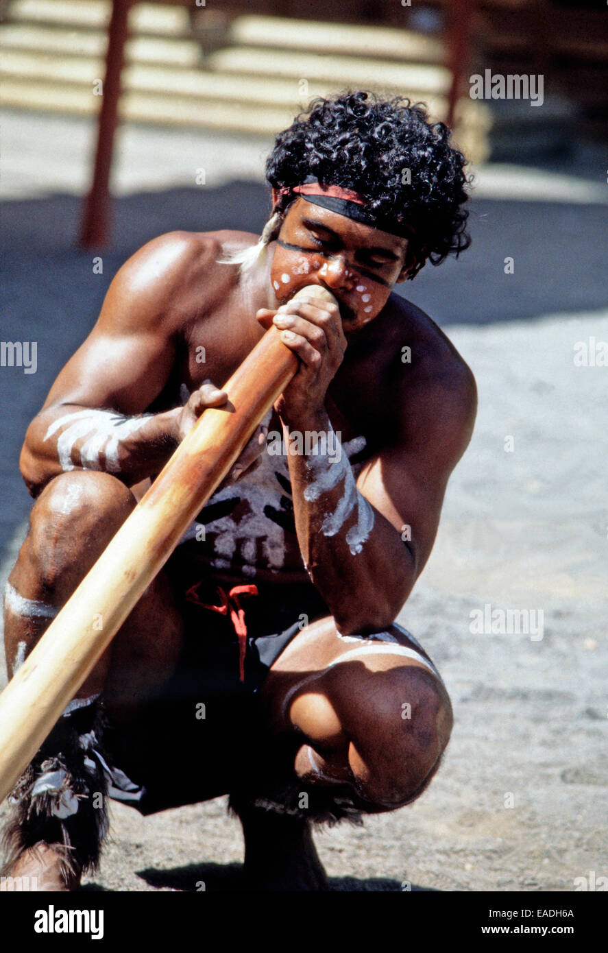 Aboriginal man blowing on a didigeridoo,Australia Stock Photo