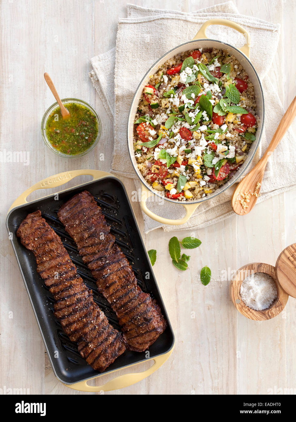 Grilled skirt steak and couscous on table Stock Photo