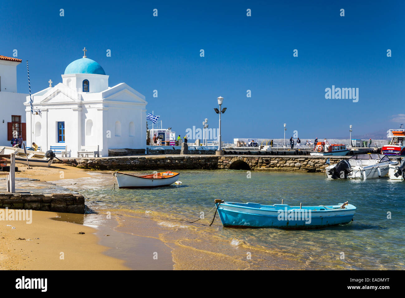 The small harbor and church in the village of Chora, Greek island, Mykonos, Greece, Europe. Stock Photo