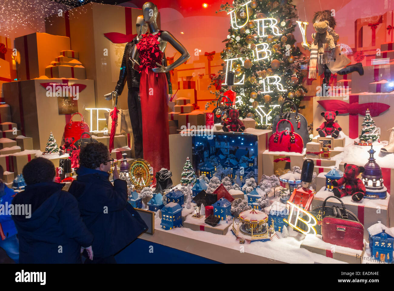 Paris, France, Children Window Shopping, French Department Store Front, Enjoying Christmas Lights, Decorations, Lighting, WIndows, Printemps, Burberry Luxury Brands Stock Photo