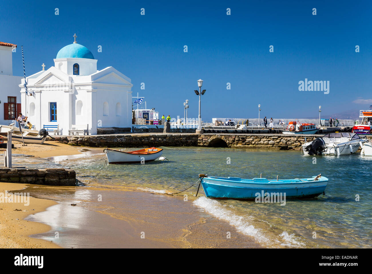 The small harbor and church in the village of Chora, Greek island, Mykonos, Greece, Europe. Stock Photo