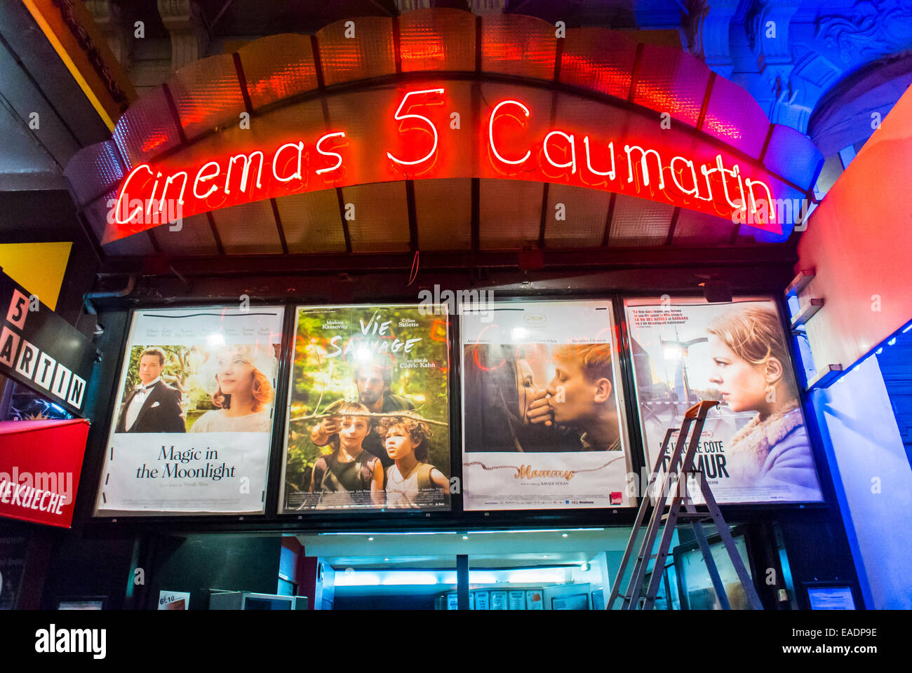 Paris, France, Front, French Independent Cinema Movies, Theater, Neon Lights at Night, '5 Caumartin'  with Movie Posters, vintage cinema sign, movie theater marquee, film movie sign Stock Photo