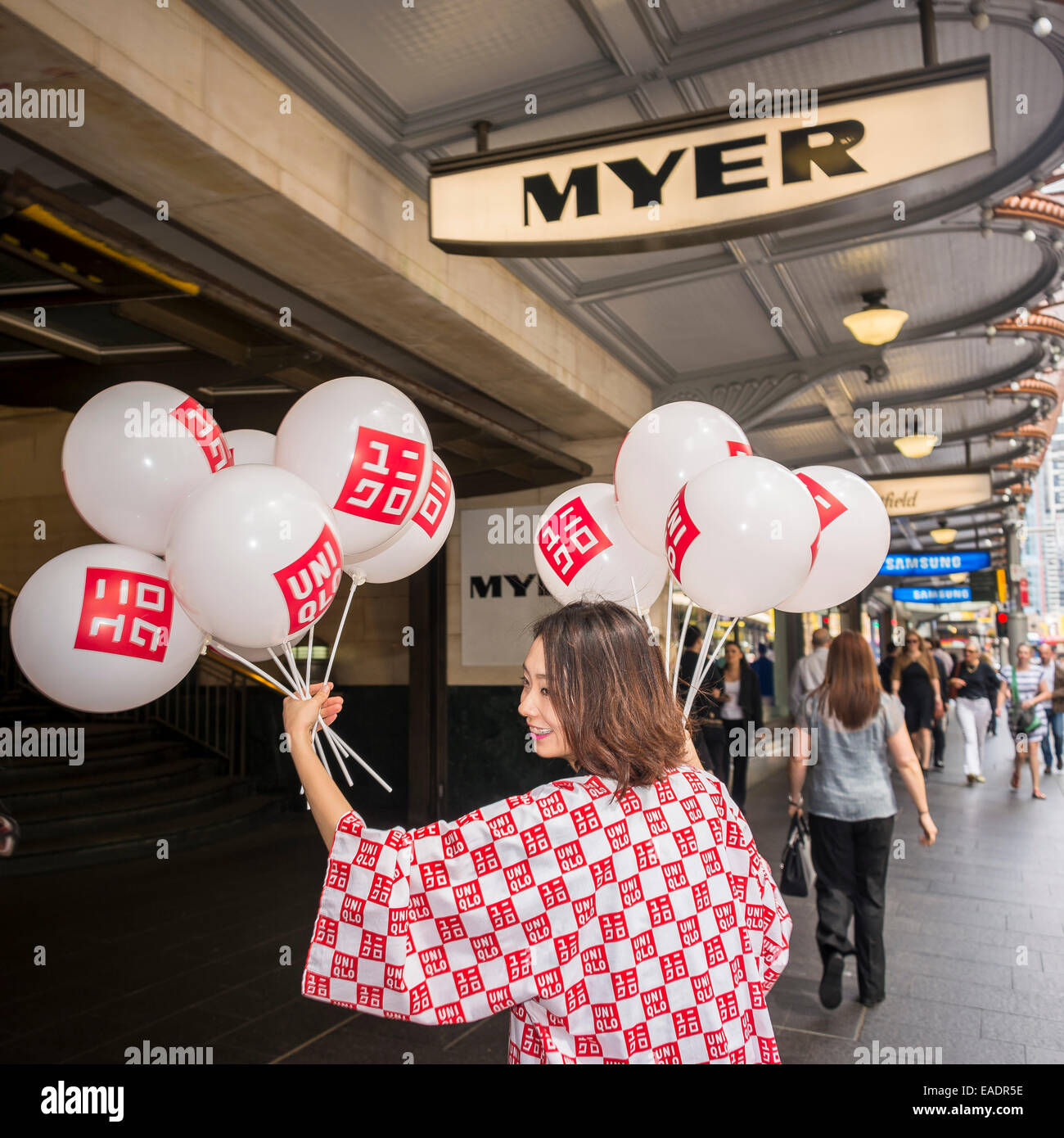 Sydney, Australia. 13th November, 2014. Uniqlo's flagship store in Sydney  handed out large balloons outside competition department store Myer.  Credit: MediaServicesAP/Alamy Live News Stock Photo - Alamy