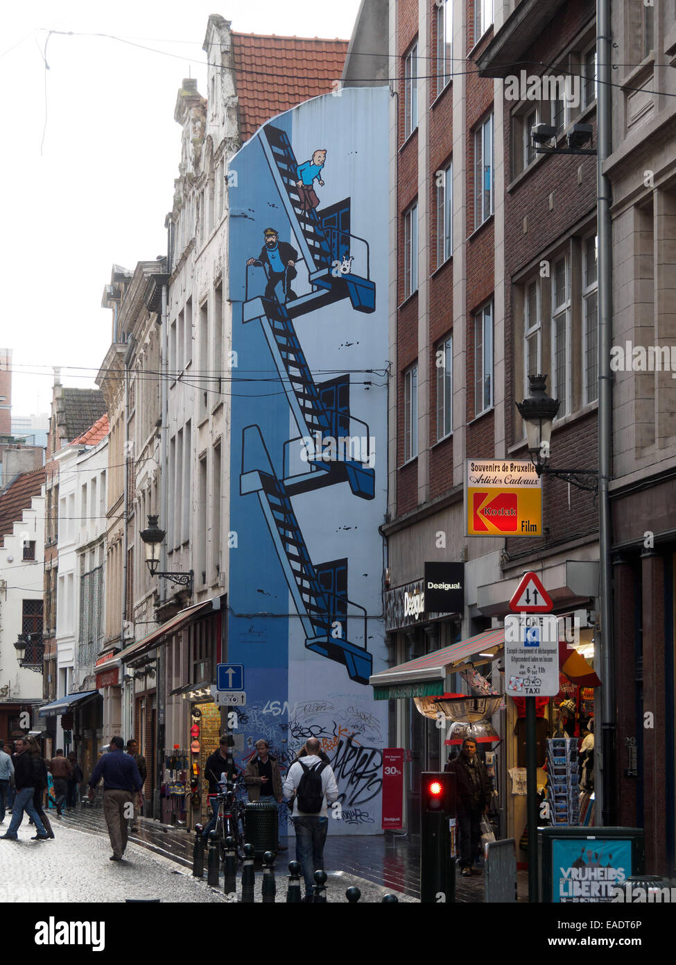Mural with Tintin and Captain Haddock  cartoon drawings on a building in Brussels, Belgium, Europe Stock Photo