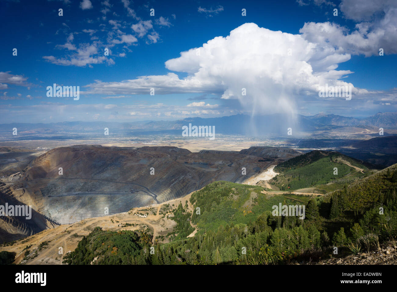 The Bingham Canyon Copper mine outside of Salt Lake City, Utah, with a squall in the distance. Stock Photo