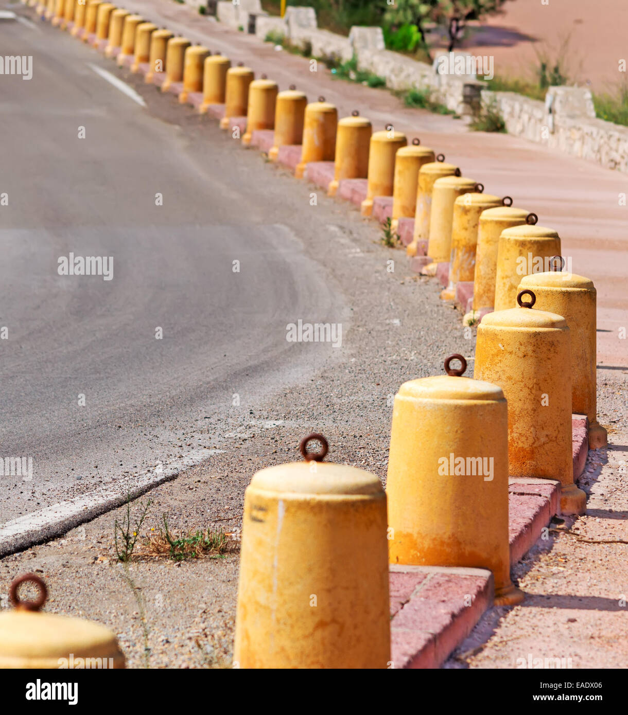 cement pylons along the road Stock Photo