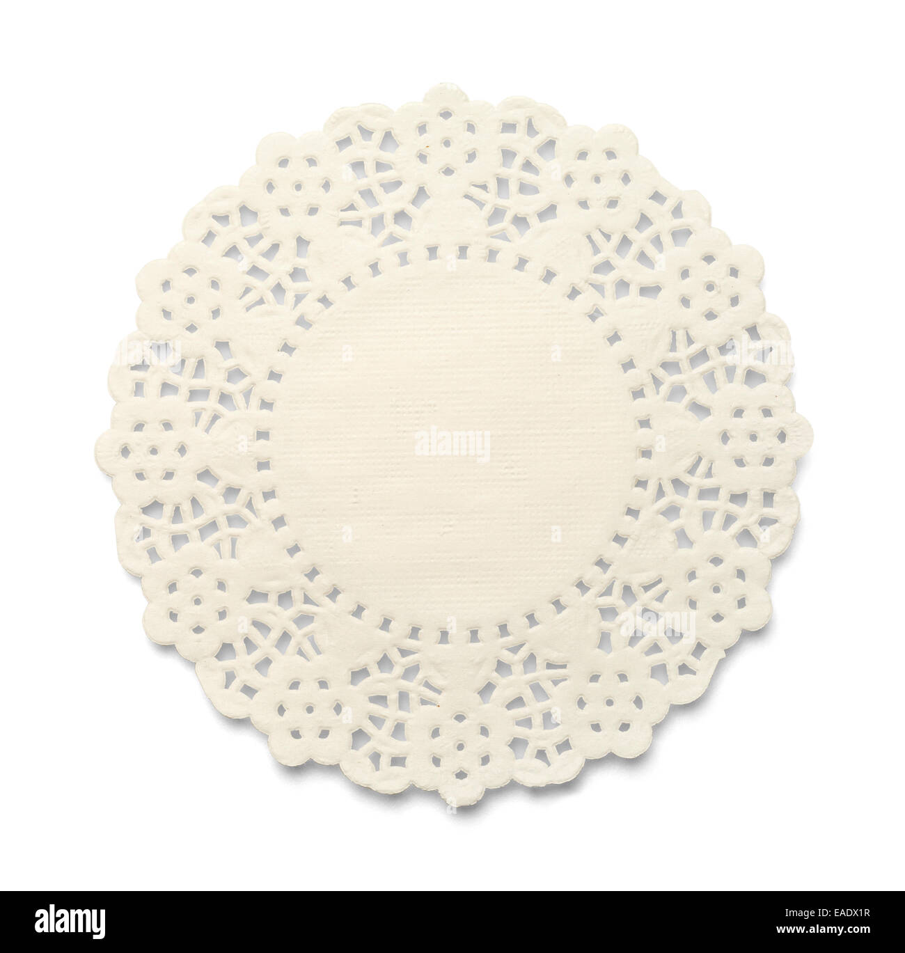 White Paper Doily With Lace Pattern Isolated on White Background. Stock Photo