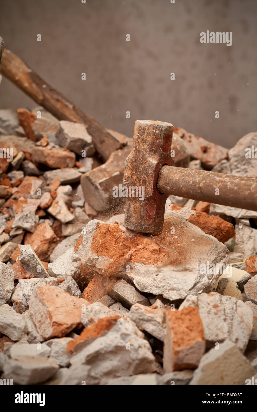 Old hammer smashing on broken brick wall Stock Photo Alamy