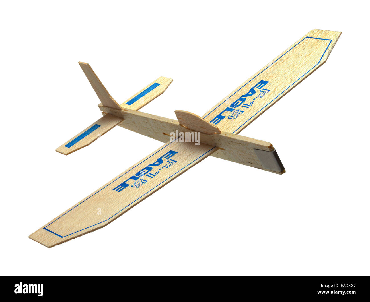 Balsa Wood Toy Plane Flying Isolated on White Background. Stock Photo