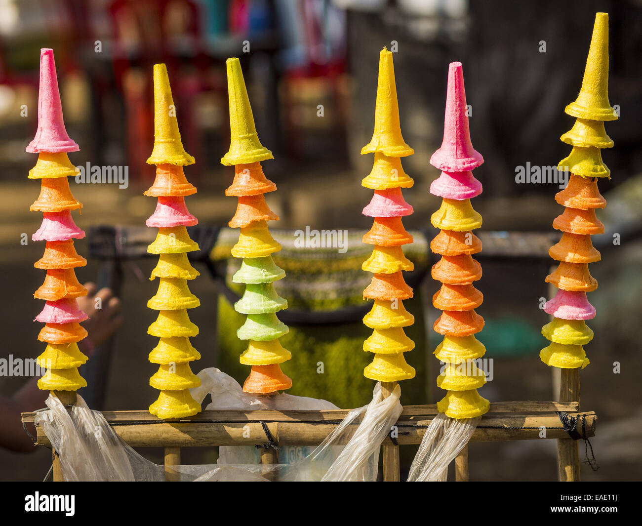 Sittwe, Rakhine, Myanmar. 9th Nov, 2014. Colored ice cream cones for
