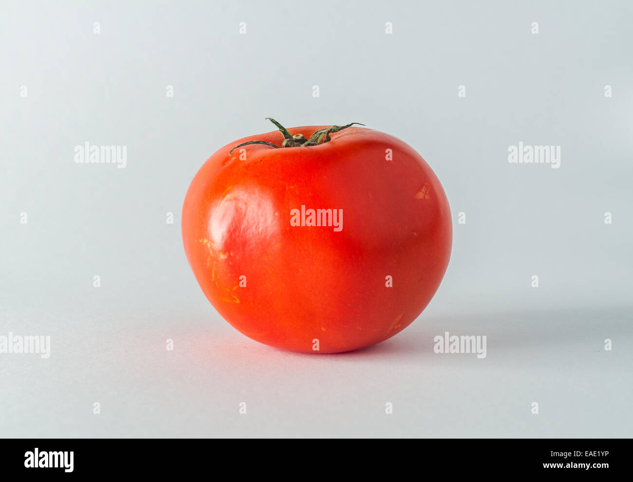 Fresh red tomato isolated on white background Stock Photo - Alamy