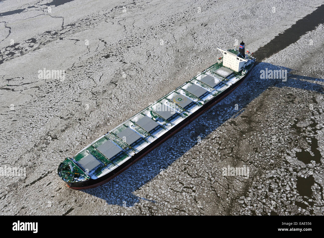 Cargo ship Prosperous on the Elbe River with ice flow, aerial view, Hamburg, Hamburg, Germany Stock Photo