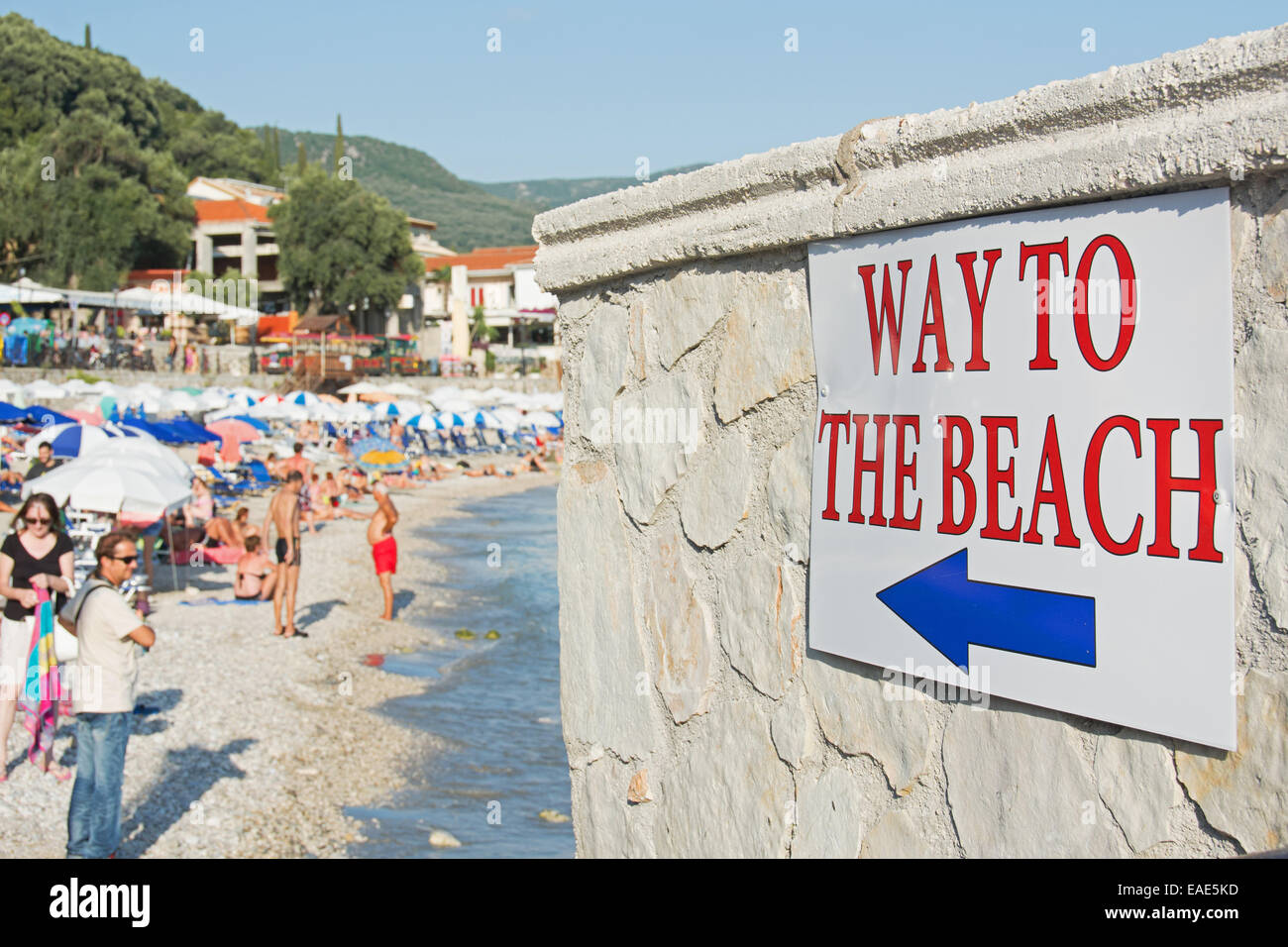 EPIRUS, GREECE. A sign pointing the way (rather unnecessarily) to Krioneri beach in Parga. 2014. Stock Photo