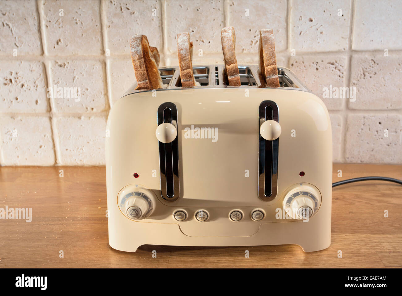Four slice toaster and toast Stock Photo Alamy