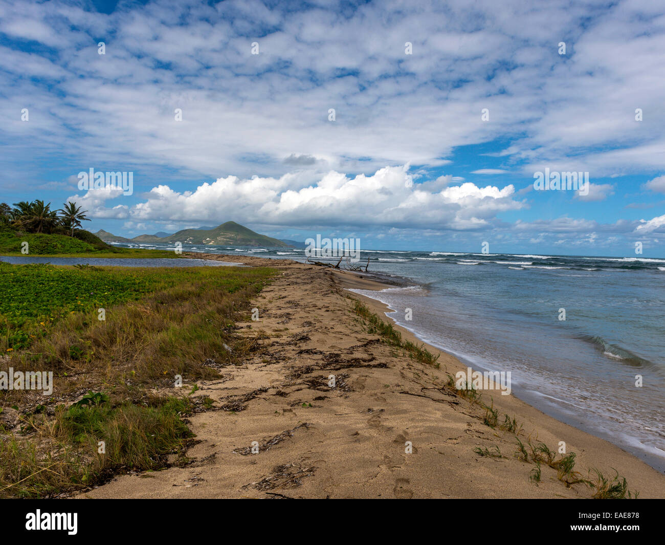 Caribbean seascape depicting Newcastle Bay beach, Nevis in foreground