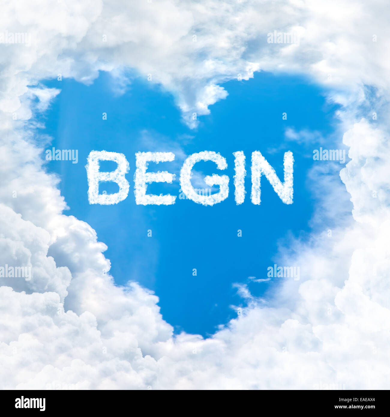 begin word nature on blue sky inside love heart cloud form Stock Photo