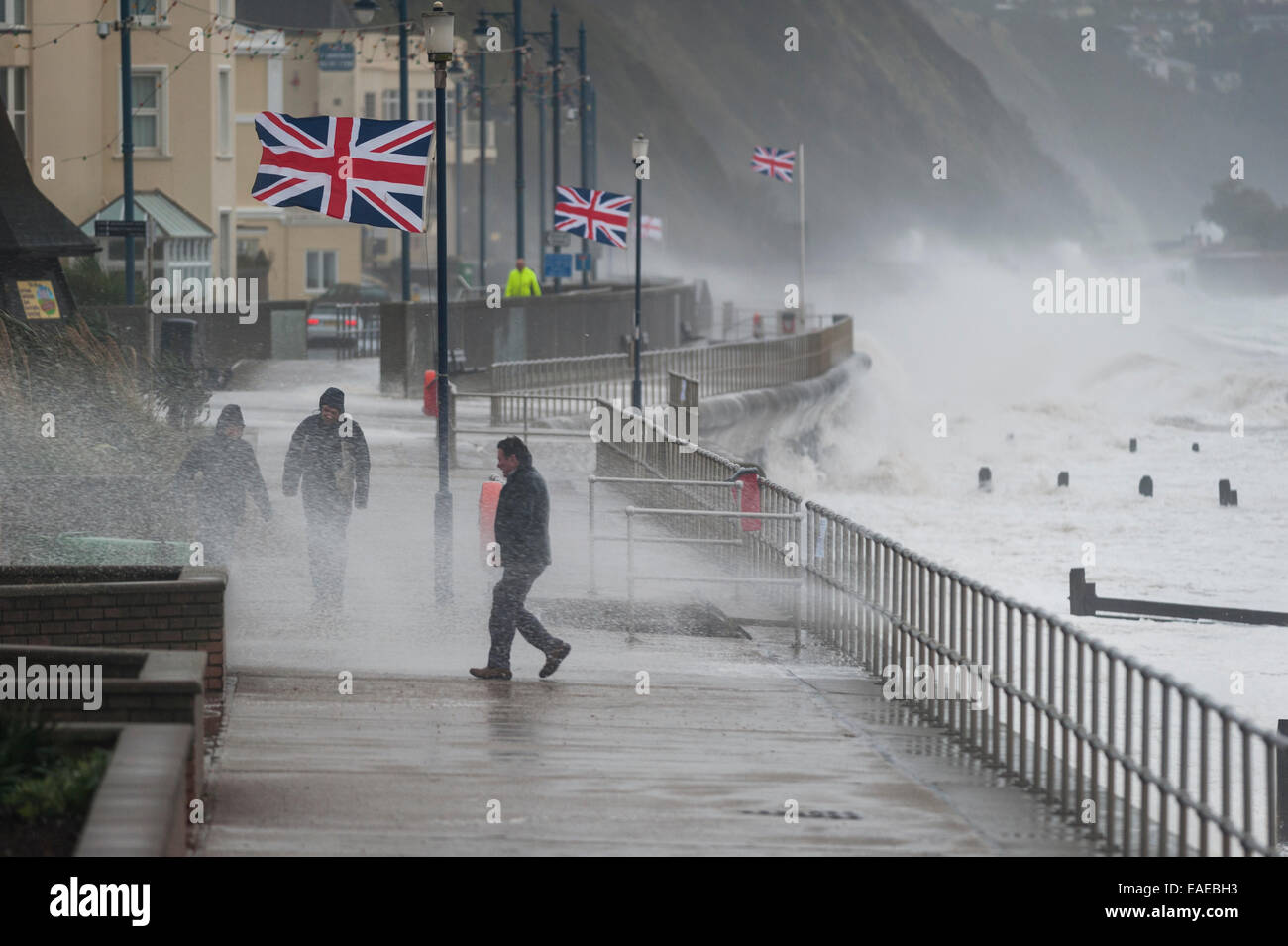 Walkers brave the elements as stormy weather batters the coast in