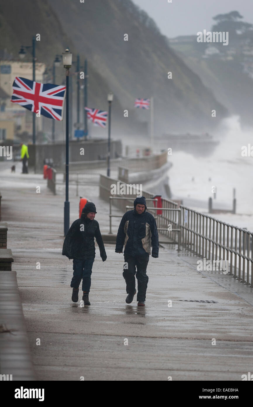 Walkers brave the elements as stormy weather batters the coast in
