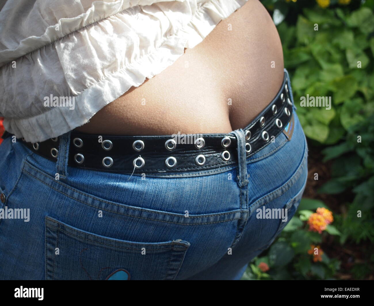 Butt crack showing with jeans Stock Photo - Alamy