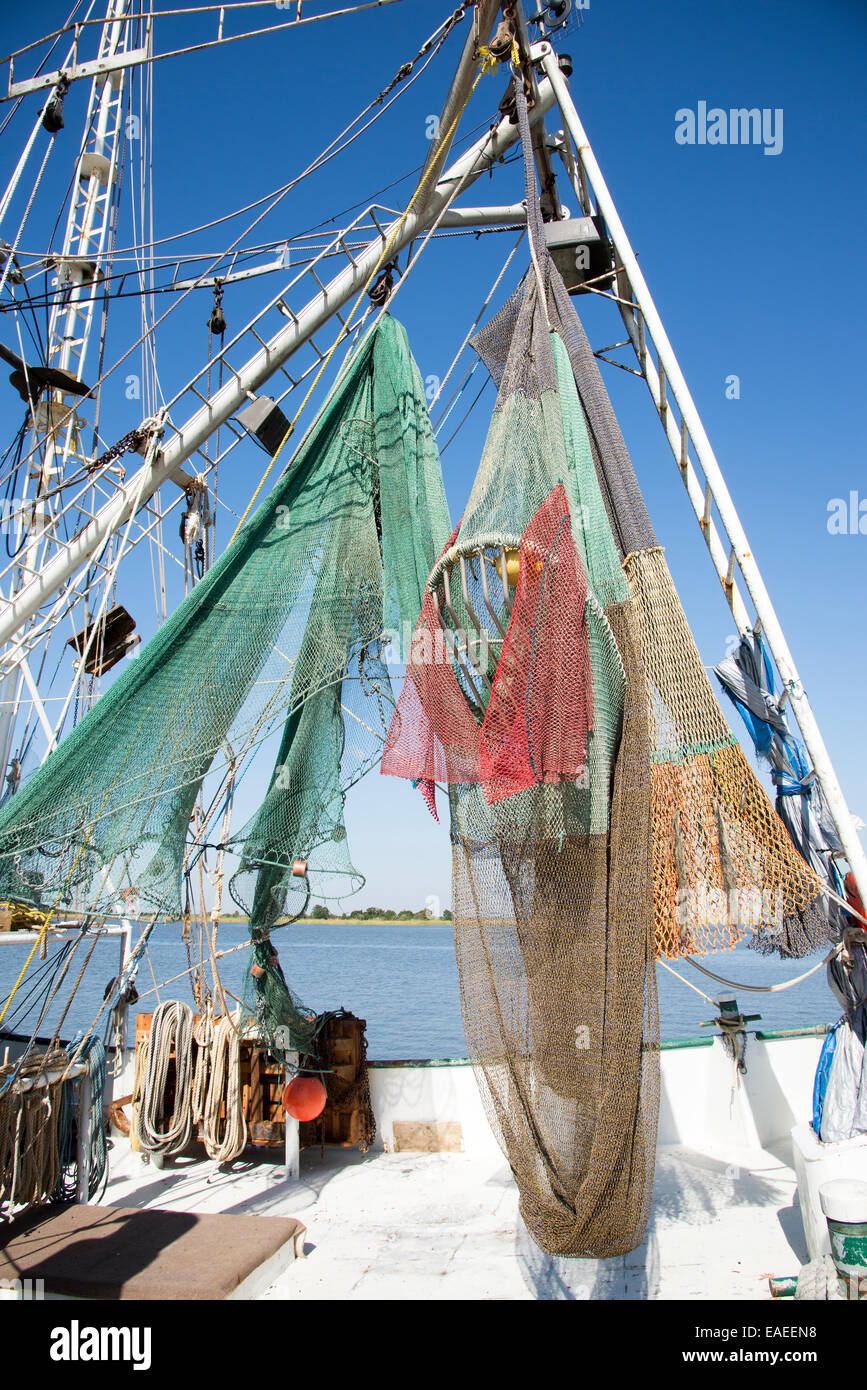 American shrimp boat with colored fishing nets in the port of