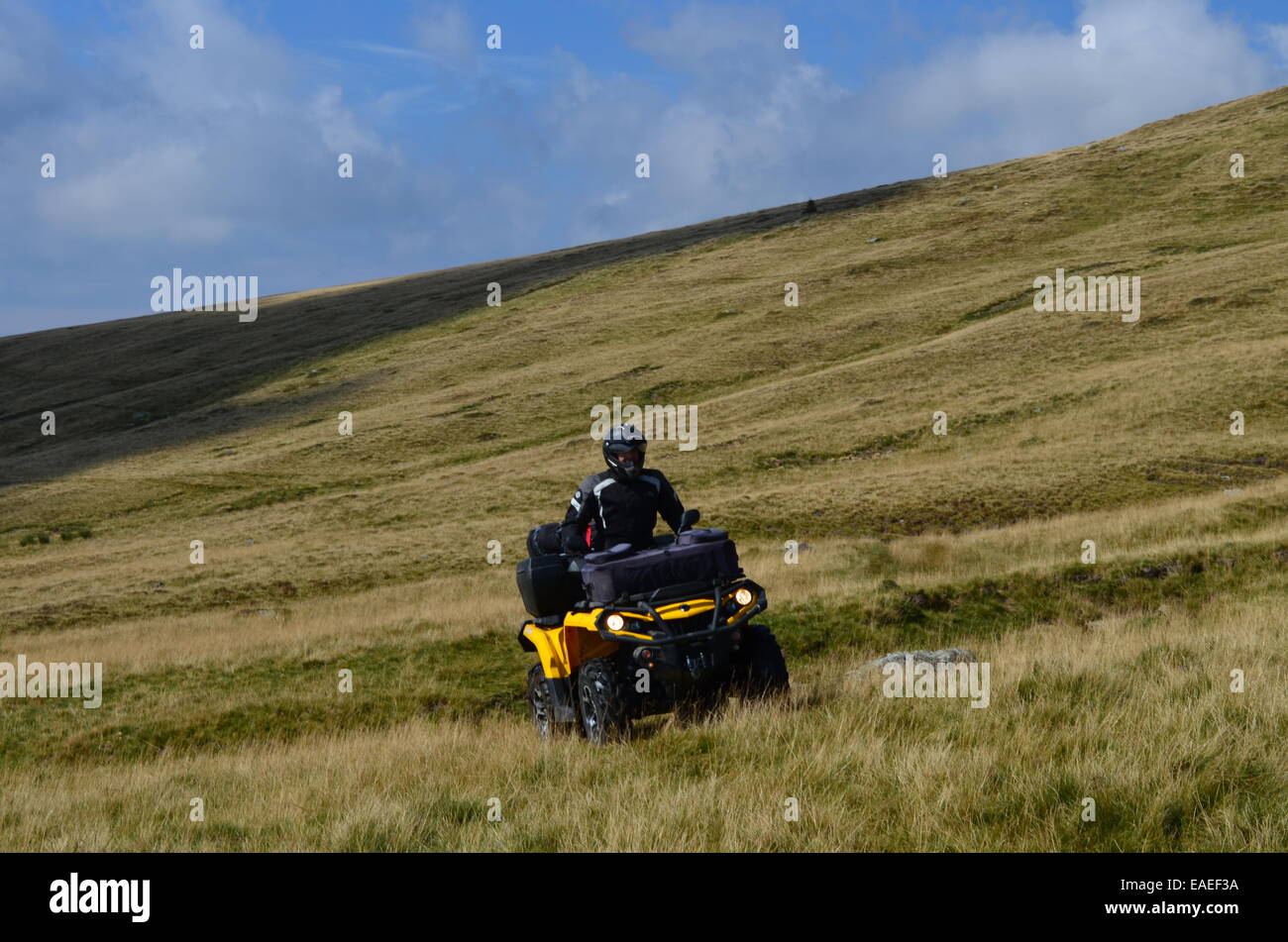 Driving ATVs in beautiful landscapes Stock Photo - Alamy
