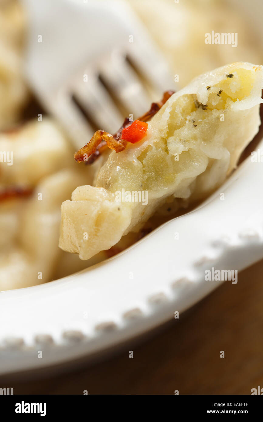 Homemade potato dumplings with onion Stock Photo